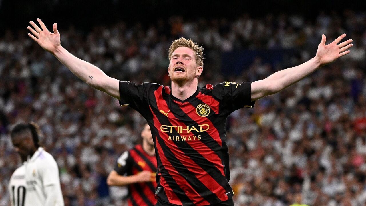 Manchester City's Belgian midfielder Kevin De Bruyne celebrates scoring his team's first goal during the UEFA Champions League semi-final first leg football match between Real Madrid CF and Manchester City at the Santiago Bernabeu stadium in Madrid on May 9, 2023.