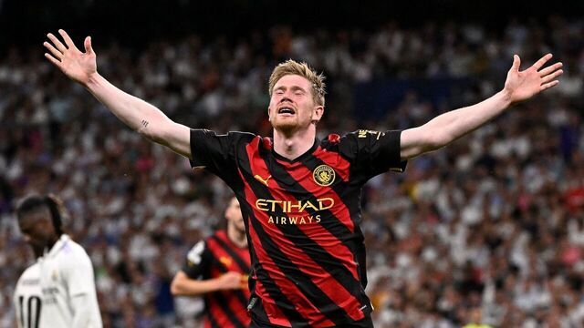 Manchester City's Belgian midfielder Kevin De Bruyne celebrates scoring his team's first goal during the UEFA Champions League semi-final first leg football match between Real Madrid CF and Manchester City at the Santiago Bernabeu stadium in Madrid on May 9, 2023.