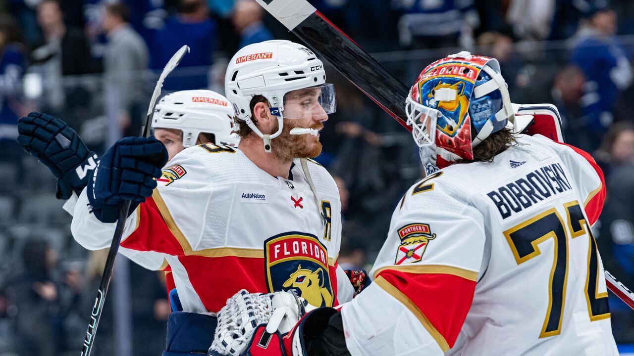 TORONTO, ON - MAY 04: Florida Panthers Left Wing Matthew Tkachuk (19) celebrates the win with Florida Panthers Goalie Sergei Bobrovsky (72) after the Round 2 NHL Stanley Cup Playoffs Game 2 between the Florida Panthers and the Toronto Maple Leafs on May 4, 2023, at Scotiabank Arena in Toronto, ON, Canada.