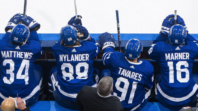 TORONTO, ON - DECEMBER 13: Mitchell Marner #16, Auston Matthews #34, John Tavares #91, and William Nylander #88 of the Toronto Maple Leafs sit on the bench against the Anaheim Ducks during the first period at the Scotiabank Arena on December 13, 2022 in Toronto, Ontario, Canada.
