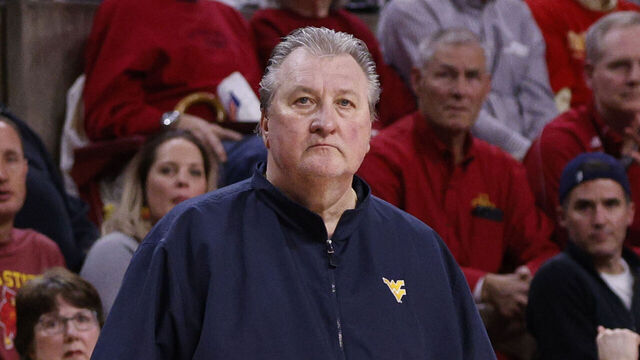 AMES, IA - FEBRUARY 27: Head coach Bob Huggins of the West Virginia Mountaineers coaches from the bench in the second half of play at Hilton Coliseum on February 27, 2023 in Ames, Iowa. The West Virginia Mountaineers won 72-69 over the Iowa State Cyclones.