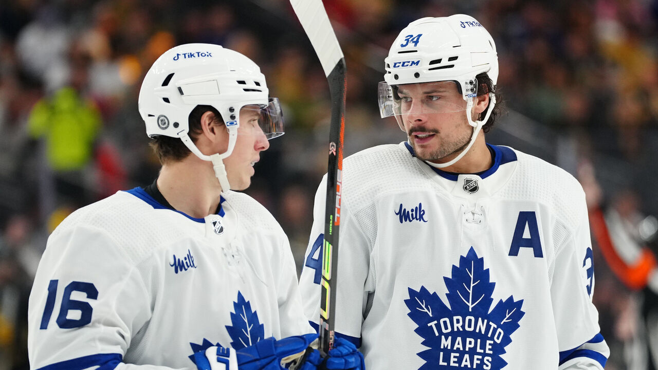 LAS VEGAS, NEVADA - OCTOBER 24: Auston Matthews #34 and Mitchell Marner #16 of the Toronto Maple Leafs talk during the second period against the Vegas Golden Knights at T-Mobile Arena on October 24, 2022 in Las Vegas, Nevada.
