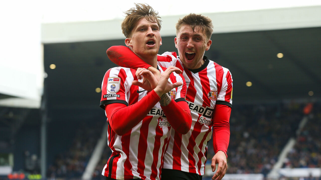 Sunderland's Dennis Cirkin celebrates scoring his 1st goal against West Bromwich Albion with team mate Sunderland's Dan Neil during the Sky Bet Championship match at The Hawthorns, West Bromwich. Picture date: Sunday April 23, 2023.