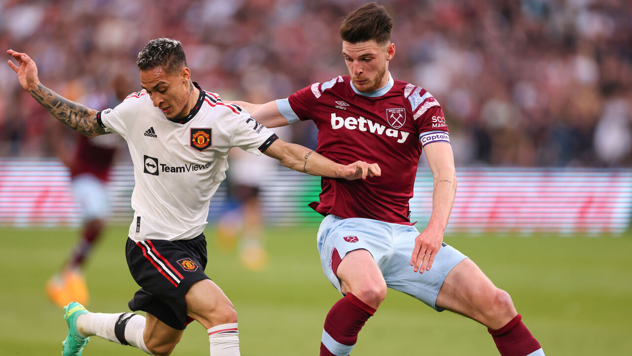LONDON, ENGLAND - MAY 7: Declan Rice of West Ham in action with Antony of Manchester United during the Premier League match between West Ham United and Manchester United at London Stadium on May 7, 2023 in London, United Kingdom.