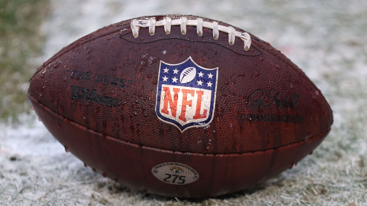 KANSAS CITY, MO - JANUARY 21: A view of a football with the NFL logo before an AFC divisional playoff game between the Jacksonville Jaguars and Kansas City Chiefs on January 21, 2023 at GEHA Field at Arrowhead Stadium in Kansas City, MO.