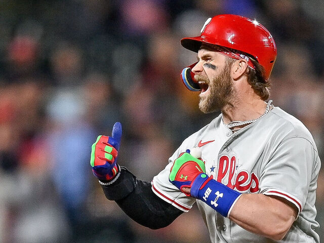 Harper tossed after charging Colorado's dugout