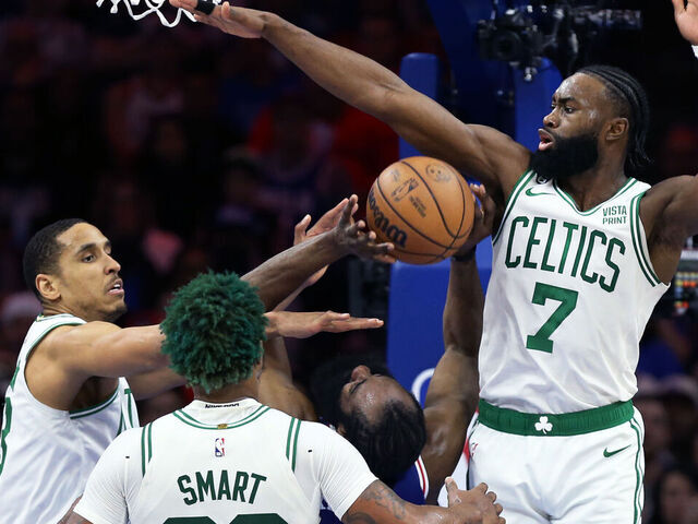 Philadelphia, PA - May 11: Boston Celtics PG Malcolm Brogdon and SG Jaylen Brown impede the progress of Philadelphia 76ers SG James Harden in the first half. The Celtics defeated the 76ers, 95-86, in Game 6 of the 2023 Eastern Conference Semifinals.
