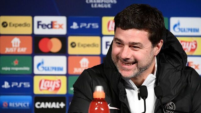 Paris Saint-Germain's Argentinian head coach Mauricio Pochettino smiles during a press conference at the Parc des Princes stadium in Paris on February 14, 2022 on the eve of the UEFA Champions League round of 16 first leg football match between Paris Saint-Germain (PSG) and Real Madrid.