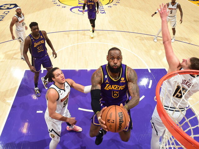 LOS ANGELES, CA - DECEMBER 16: LeBron James #6 of the Los Angeles Lakers drives to the basket during the game against the Denver Nuggets on December 16, 2022 at Crypto.Com Arena in Los Angeles, California. NOTE TO USER: User expressly acknowledges and agrees that, by downloading and/or using this Photograph, user is consenting to the terms and conditions of the Getty Images License Agreement. Mandatory Copyright Notice: Copyright 2022 NBAE