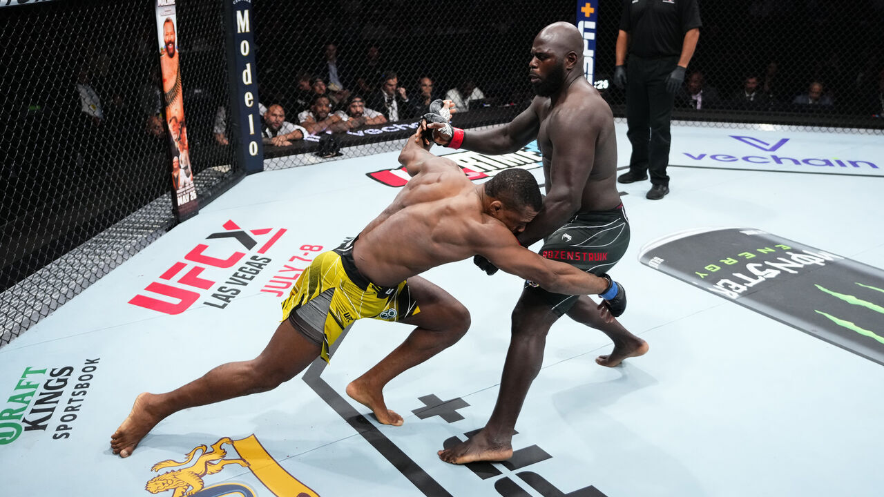 CHARLOTTE, NORTH CAROLINA - MAY 13: (L-R) Jailton Almeida of Brazil attempts to take down Jairzinho Rozenstruik of Suriname in their heavyweight fight during the UFC Fight Night event at Spectrum Center on May 13, 2023 in Charlotte, North Carolina.