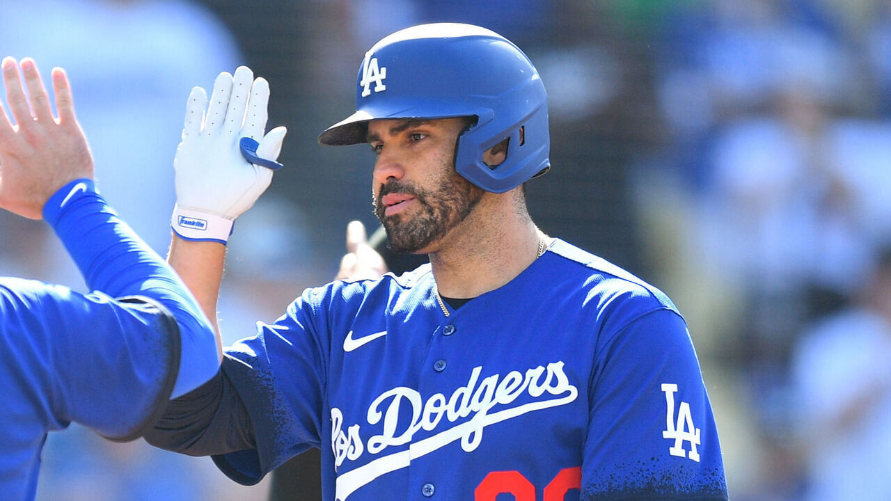 LOS ANGELES, CA - MAY 13: Los Angeles Dodgers designated hitter J.D. Martinez (28) gets a high five from Los Angeles Dodgers third baseman Max Muncy (13) after a home run during the MLB game between the San Diego Padres and the Los Angeles Dodgers on May 13, 2023 at Dodger Stadium in Los Angeles, CA.