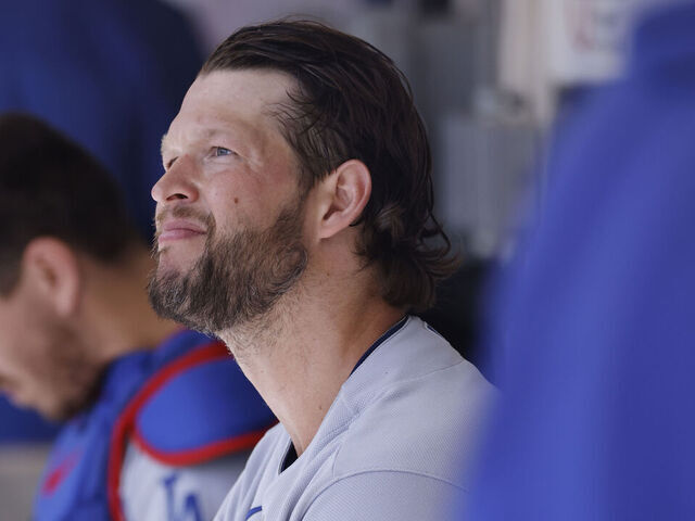MILWAUKEE, WI - MAY 10: Los Angeles Dodgers starting pitcher Clayton Kershaw (22) looks on in the dugout during an MLB game against the Milwaukee Brewers on May 10, 2023 at American Family Field in Milwaukee, Wisconsin.