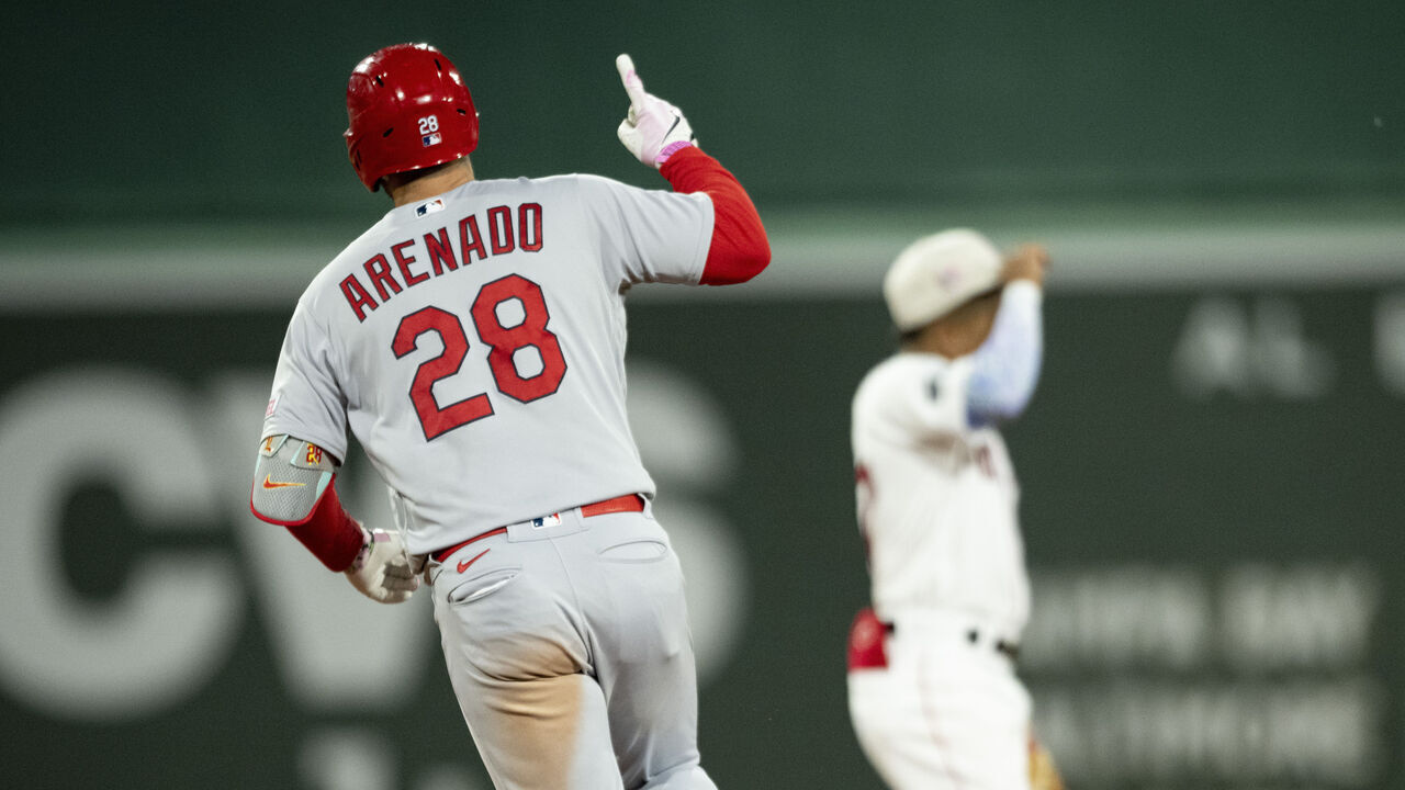 BOSTON, MA - MAY 14: Nolan Arenado #28 of the St. Louis Cardinals reacts after hitting a two-run home run during the eighth inning of a game against the Boston Red Soxon May 14, 2023 at Fenway Park in Boston, Massachusetts.
