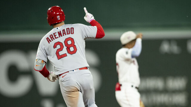 BOSTON, MA - MAY 14: Nolan Arenado #28 of the St. Louis Cardinals reacts after hitting a two-run home run during the eighth inning of a game against the Boston Red Soxon May 14, 2023 at Fenway Park in Boston, Massachusetts.
