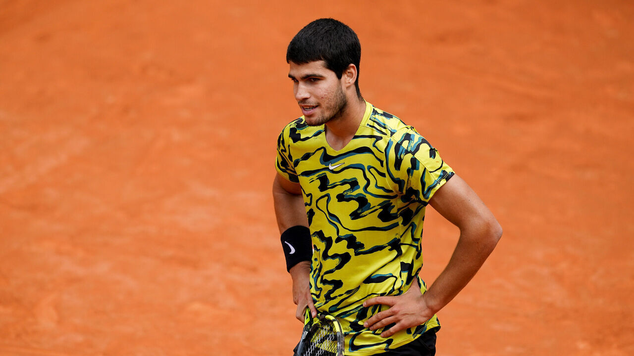 Carlos Alcaraz of Spain looks dejected during the Men's Singles match against Fabian marozsan of Hungary during Day Eight of the Internazionali BNL D'Italia 2023 at Foro Italico on May 15, 2023 in Rome, Italy