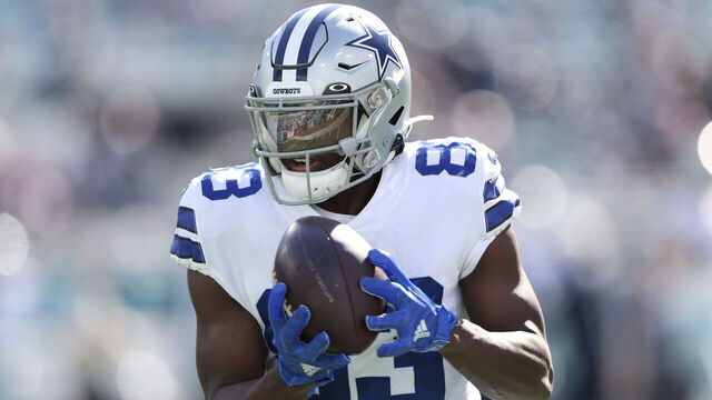 JACKSONVILLE, FLORIDA - DECEMBER 18: James Washington #83 of the Dallas Cowboys catches a pass before the game against the Jacksonville Jaguars at TIAA Bank Field on December 18, 2022 in Jacksonville, Florida.