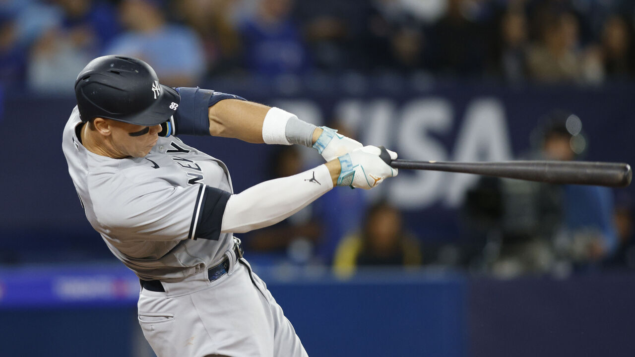 TORONTO, ON - MAY 15: Aaron Judge #99 of the New York Yankees hits a solo home run in the eighth inning of their MLB game against the Toronto Blue Jays at Rogers Centre on May 15, 2023 in Toronto, Canada.