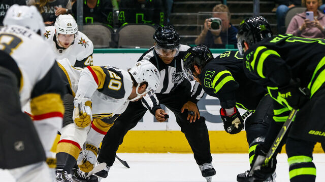 DALLAS, TX - APRIL 08: Vegas Golden Knights center Chandler Stephenson (20) and Dallas Stars center Tyler Seguin (91) face-off during the game between the Dallas Stars and the Vegas Golden Knights on April 8, 2023 at American Airlines Center in Dallas, Texas.