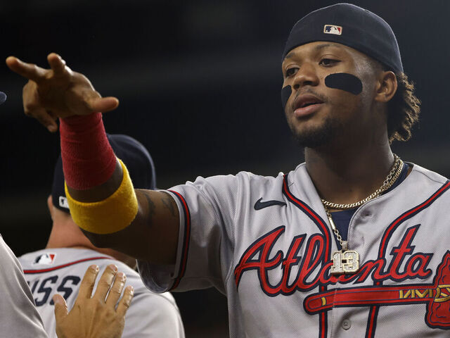 Orlando Arcia of the Atlanta Braves celebrates with teammates in the  News Photo - Getty Images