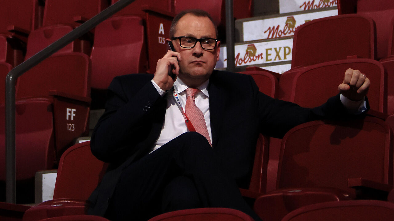 MONTREAL, QUEBEC - JULY 07: General Manager Brad Treliving of the Calgary Flames looks on prior to Round One of the 2022 Upper Deck NHL Draft at Bell Centre on July 07, 2022 in Montreal, Quebec, Canada.
