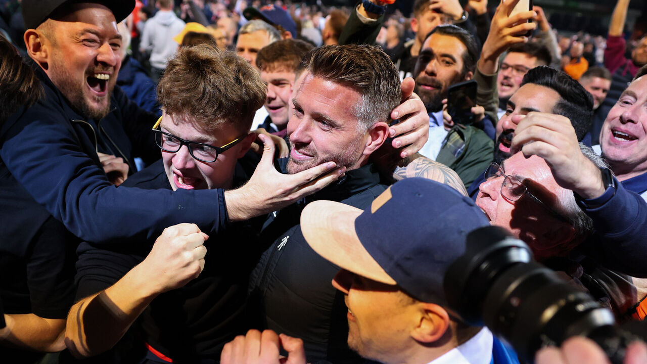 LUTON, ENGLAND - MAY 16: Luton Town manager Rob Edwards is mobbed by fans after reaching the play-off final during the Sky Bet Championship Play-Off Semi-Final Second Leg match between Luton Town v Sunderland at Kenilworth Road on May 16, 2023 in Luton, United Kingdom.