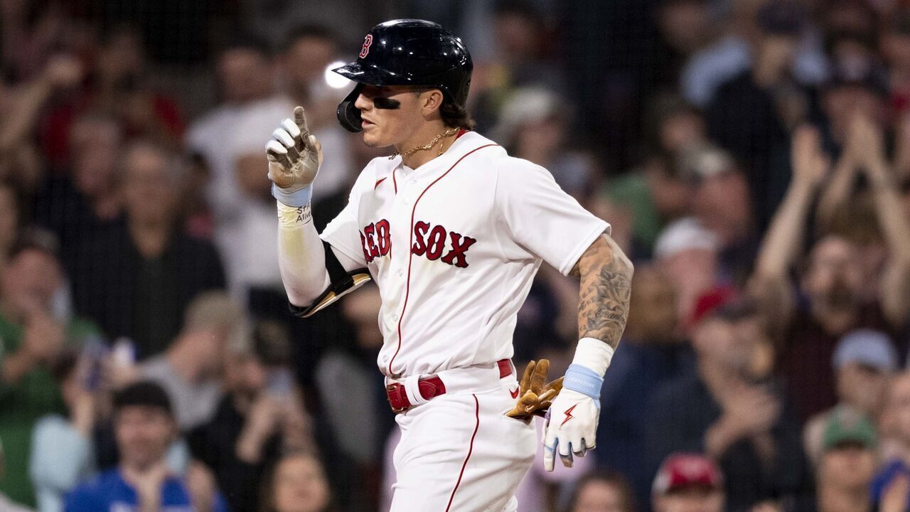 BOSTON, MA - MAY 16: Jarren Duran #16 of the Boston Red Sox reacts after hitting a two-run home run during the fifth inning of a game against the Seattle Mariners on May 16, 2023 at Fenway Park in Boston, Massachusetts.