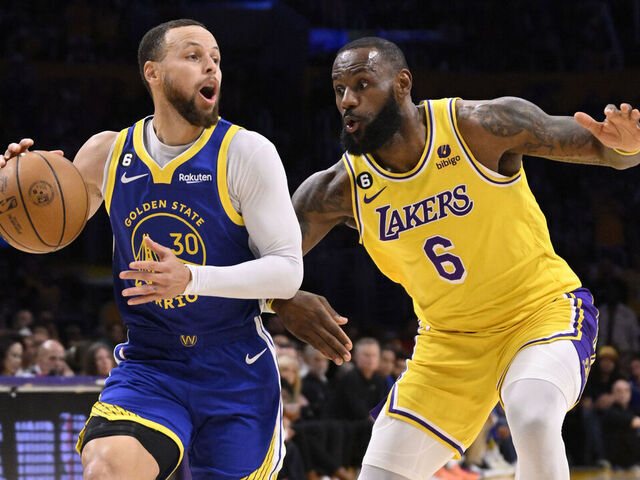 Los Angeles, CA - May 12: Stephen Curry #30 of the Golden State Warriors controls the ball against LeBron James #6 of the Los Angeles Lakers in the first half of game 6 of a Western Conference Semifinals NBA playoff basketball game at the Crypto.com Arena in Los Angeles on Friday, May 12, 2023.