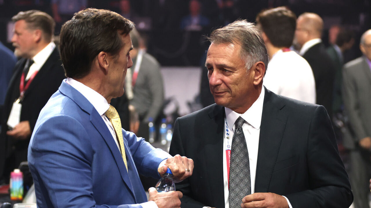 MONTREAL, QUEBEC - JULY 07: (L-R) President of hockey operations George McPhee of the Vegas Golden Knights and general manager Ken Holland of the Edmonton Oilers look on prior to the first round of the 2022 Upper Deck NHL Draft at Bell Centre on July 07, 2022 in Montreal, Quebec.