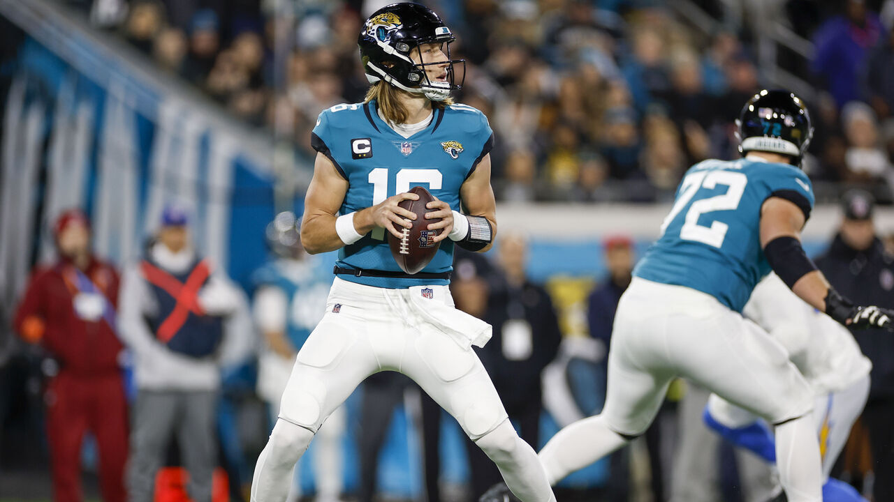 JACKSONVILLE, FL - JANUARY 14: Jacksonville Jaguars quarterback Trevor Lawrence (16) throws a pass during the game between the Los Angeles Chargers and the Jacksonville Jaguars on January 14, 2023 at TIAA Bank Field in Jacksonville, Fl.