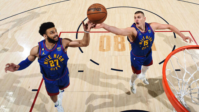 DENVER, CO - MAY 16: Jamal Murray #27 and Nikola Jokic #15 of the Denver Nuggets attempt to rebound the ball during Round 3 Game 1 of the Western Conference Finals 2023 NBA Playoffs against the Los Angeles Lakers on May 16, 2023 at the Ball Arena in Denver, Colorado. NOTE TO USER: User expressly acknowledges and agrees that, by downloading and/or using this Photograph, user is consenting to the terms and conditions of the Getty Images License Agreement. Mandatory Copyright Notice: Copyright 2023 NBAE
