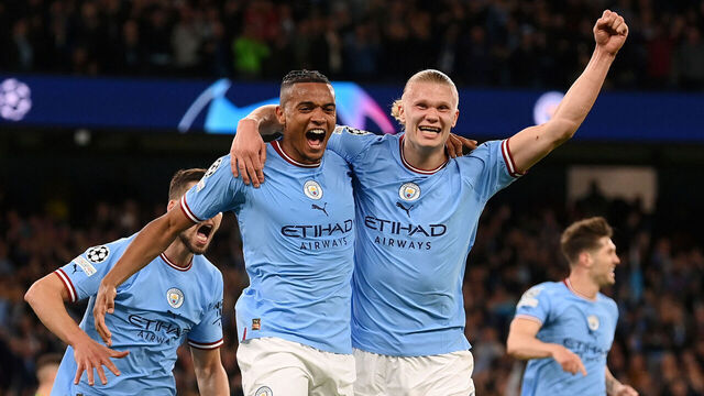MANCHESTER, ENGLAND - MAY 17: Manuel Akanji celebrates with Erling Haaland of Manchester City after an own goal by Eder Militao of Real Madrid (not pictured) Manchester City's third goal during the UEFA Champions League semi-final second leg match between Manchester City FC and Real Madrid at Etihad Stadium on May 17, 2023 in Manchester, England.