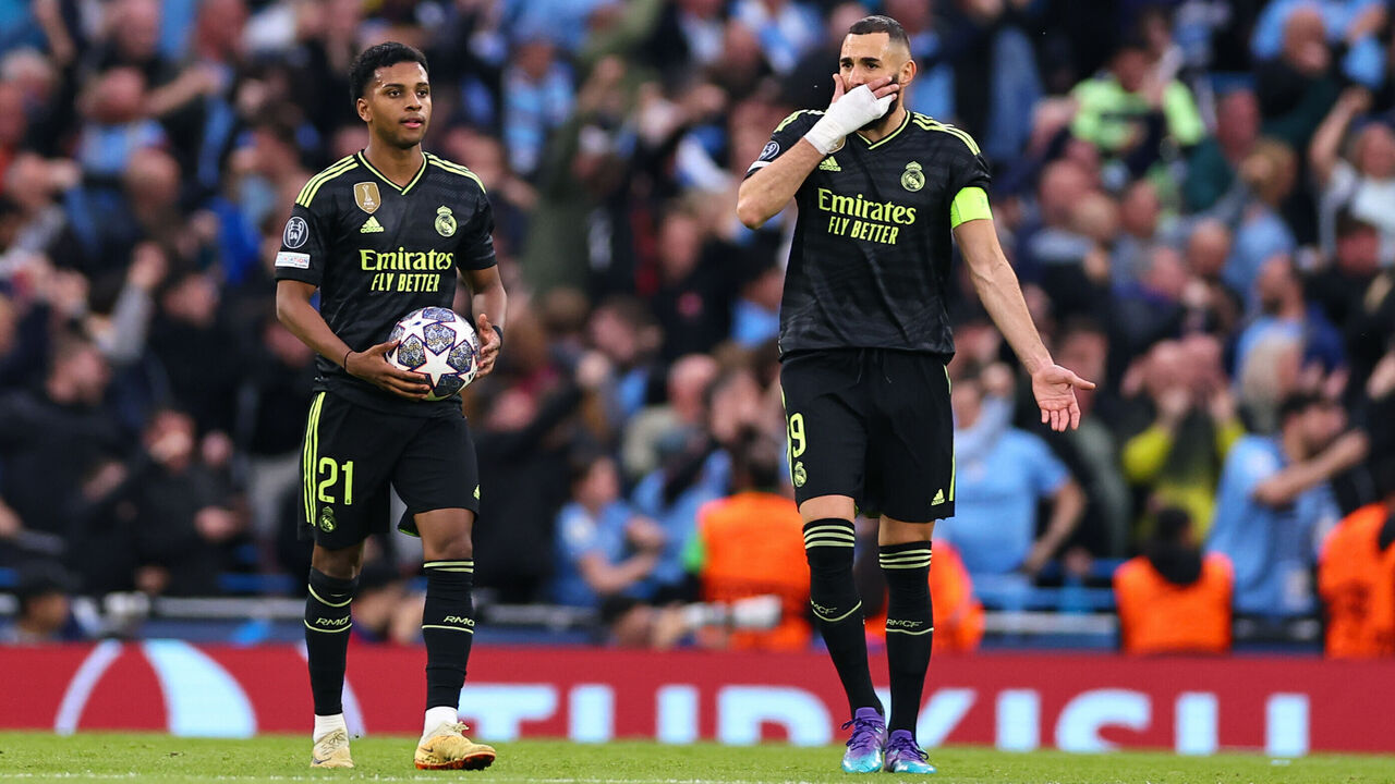 MANCHESTER, ENGLAND - MAY 17: A dejected Karim Benzema and Rodrygo of Real Madrid as Manchester City score a goal to make it 1-0 during the UEFA Champions League semi-final second leg match between Manchester City FC and Real Madrid at Etihad Stadium on May 17, 2023 in Manchester, United Kingdom.