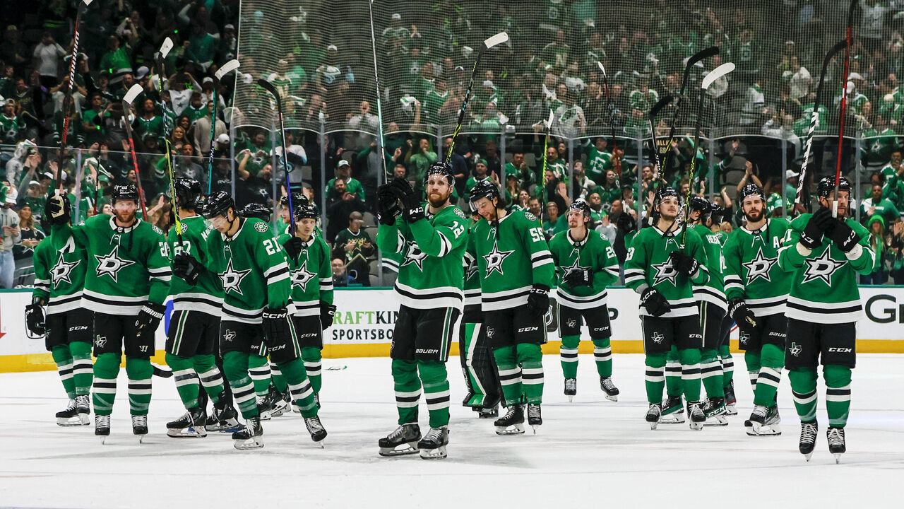 DALLAS, TX - MAY 15: The Dallas Stars players raise their sticks to the fans after winning the Western Conference Second Round playoff game 7 between the Dallas Stars and the Seattle Kraken on May 15, 2023 at American Airlines Center in Dallas, Texas.