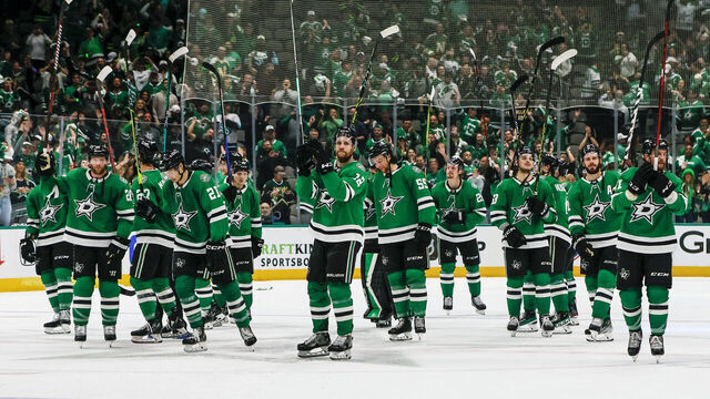 DALLAS, TX - MAY 15: The Dallas Stars players raise their sticks to the fans after winning the Western Conference Second Round playoff game 7 between the Dallas Stars and the Seattle Kraken on May 15, 2023 at American Airlines Center in Dallas, Texas.