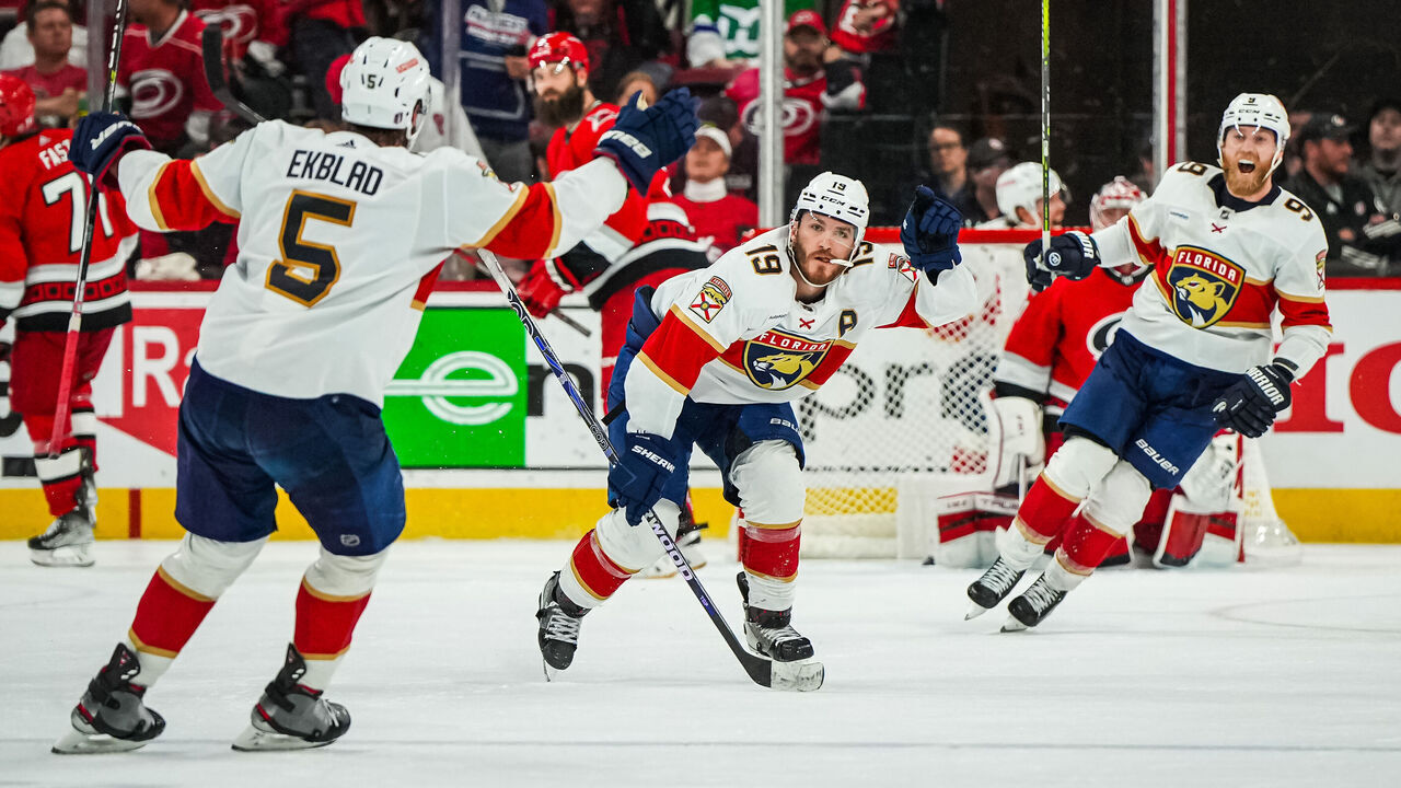 RALEIGH, NORTH CAROLINA - MAY 18: Matthew Tkachuk #19 of the Florida Panthers celebrates with teammates after scoring the game-winning goal during the fourth overtime to defeat the Carolina Hurricanes in Game One of the Eastern Conference Final of the 2023 Stanley Cup Playoffs at PNC Arena on May 18, 2023 in Raleigh, North Carolina.