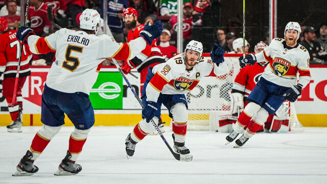 RALEIGH, NORTH CAROLINA - MAY 18: Matthew Tkachuk #19 of the Florida Panthers celebrates with teammates after scoring the game-winning goal during the fourth overtime to defeat the Carolina Hurricanes in Game One of the Eastern Conference Final of the 2023 Stanley Cup Playoffs at PNC Arena on May 18, 2023 in Raleigh, North Carolina.