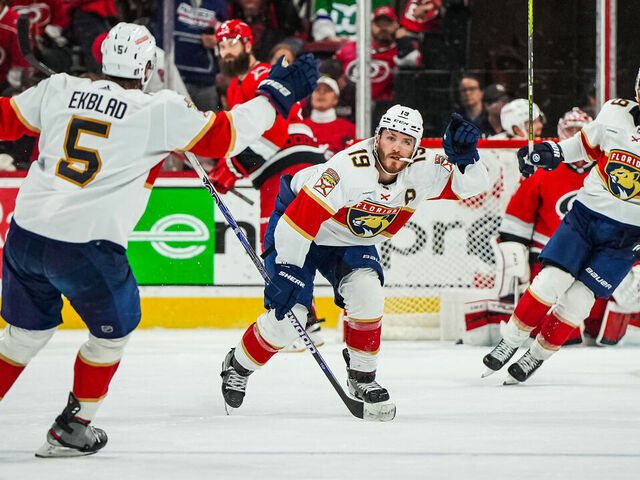 RALEIGH, NORTH CAROLINA - MAY 18: Matthew Tkachuk #19 of the Florida Panthers celebrates with teammates after scoring the game-winning goal during the fourth overtime to defeat the Carolina Hurricanes in Game One of the Eastern Conference Final of the 2023 Stanley Cup Playoffs at PNC Arena on May 18, 2023 in Raleigh, North Carolina.