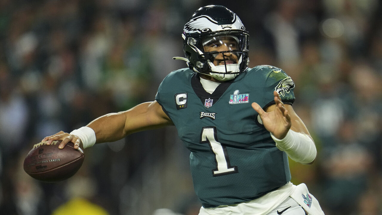 GLENDALE, AZ - FEBRUARY 12: Jalen Hurts #1 of the Philadelphia Eagles throws the ball against the Kansas City Chiefs after Super Bowl LVII at State Farm Stadium on February 12, 2023 in Glendale, Arizona. The Chiefs defeated the Eagles 38-35.