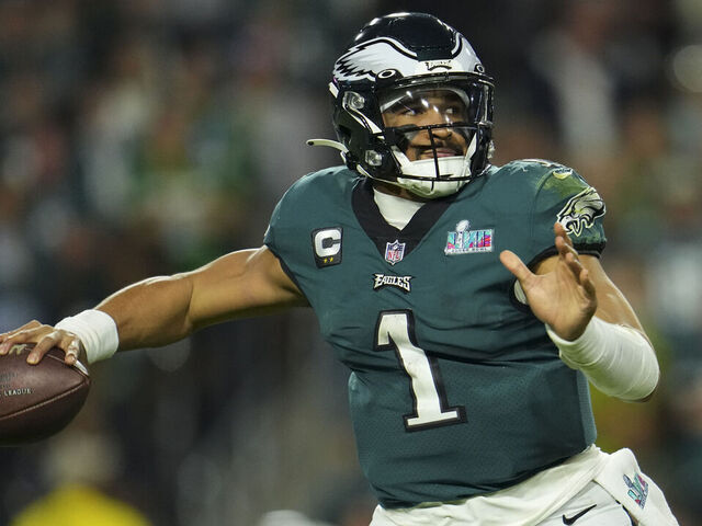 GLENDALE, AZ - FEBRUARY 12: Jalen Hurts #1 of the Philadelphia Eagles throws the ball against the Kansas City Chiefs after Super Bowl LVII at State Farm Stadium on February 12, 2023 in Glendale, Arizona. The Chiefs defeated the Eagles 38-35.