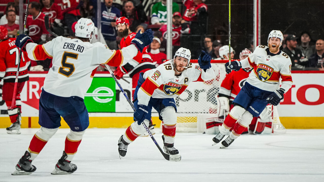 RALEIGH, NORTH CAROLINA - MAY 18: Matthew Tkachuk #19 of the Florida Panthers celebrates with teammates after scoring the game-winning goal during the fourth overtime to defeat the Carolina Hurricanes in Game One of the Eastern Conference Final of the 2023 Stanley Cup Playoffs at PNC Arena on May 18, 2023 in Raleigh, North Carolina.