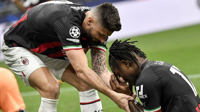 Olivier Giroud of AC Milan comforts disappointed Rafael Leao during the Uefa Champions League football match between FC Internazionale and AC Milan at San Siro stadium. Milan (Italy), May 16th 2023.