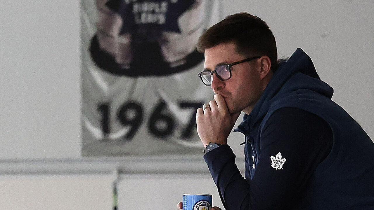 TORONTO, ON- MAY 3 - Kyle Dubas watches as the Toronto Maple Leafs practice between games 1 and 2 for their second round of the NHL Stanley Cup playoffs series against the Florida Panthers at Ford Performance Centre in Toronto. May 3, 2023. (Steve Russell/Toronto Star via Getty Images)