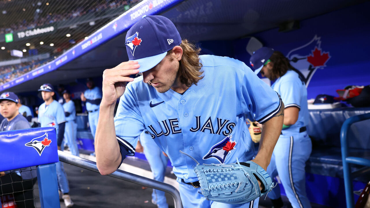TORONTO, ON - MAY 16: Kevin Gausman #34 of the Toronto Blue Jays runs onto the field prior to a game against the New York Yankees at Rogers Centre on May 16, 2023 in Toronto, Ontario, Canada.