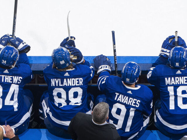 TORONTO, ON - DECEMBER 13: Mitchell Marner #16, Auston Matthews #34, John Tavares #91, and William Nylander #88 of the Toronto Maple Leafs sit on the bench against the Anaheim Ducks during the first period at the Scotiabank Arena on December 13, 2022 in Toronto, Ontario, Canada.