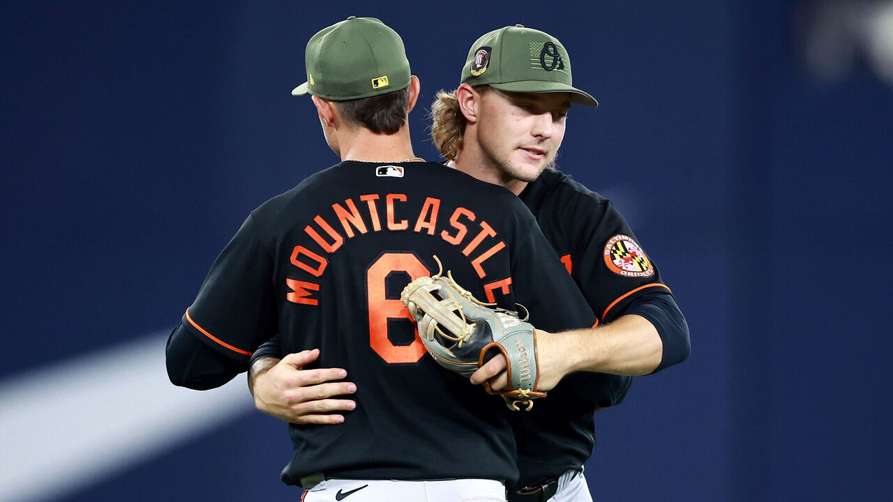 Baltimore Orioles' Adam Frazier and Blue Jays' Alek Manoah