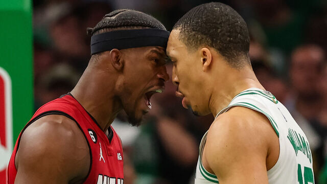 BOSTON, MASSACHUSETTS - MAY 19: Jimmy Butler #22 of the Miami Heat exchanges words with Grant Williams #12 of the Boston Celtics during the fourth quarter in game two of the Eastern Conference Finals at TD Garden on May 19, 2023 in Boston, Massachusetts.