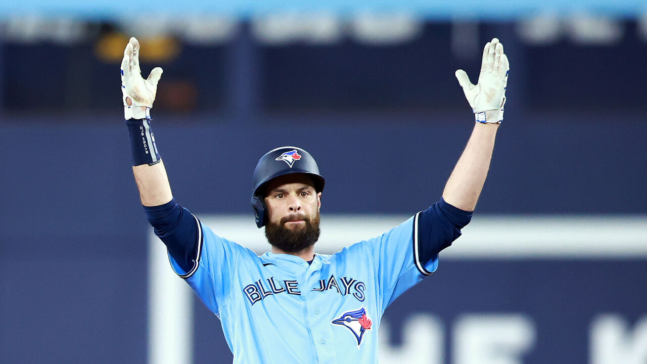 TORONTO, ON - MAY 19: Brandon Belt #13 of the Toronto Blue Jays celebrates a double in the second inning against the Baltimore Orioles at Rogers Centre on May 19, 2023 in Toronto, Ontario, Canada.
