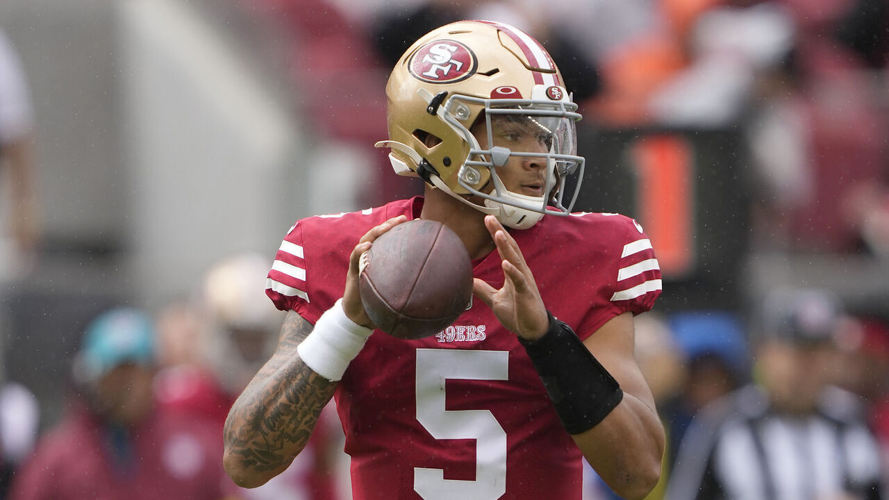 SANTA CLARA, CALIFORNIA - SEPTEMBER 18: Trey Lance #5 of the San Francisco 49ers looks to pass the ball against the Seattle Seahawks during the first quarter at Levi's Stadium on September 18, 2022 in Santa Clara, California.