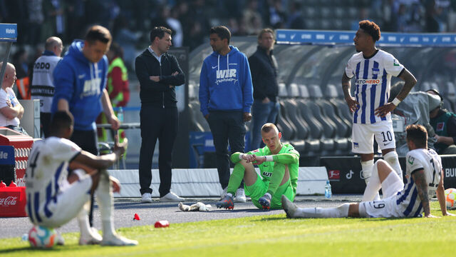 BERLIN, GERMANY - MAY 20: Oliver Christensen of Hertha Berlin and teammates look dejected after the final whistle of the Bundesliga match between Hertha BSC and VfL Bochum 1848 at Olympiastadion on May 20, 2023 in Berlin, Germany.