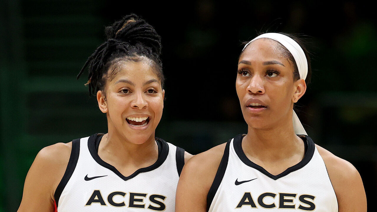 SEATTLE, WASHINGTON - MAY 20: Candace Parker #3 and A'ja Wilson #22 of the Las Vegas Aces look on during the third quarter against the Seattle Storm at Climate Pledge Arena on May 20, 2023 in Seattle, Washington.